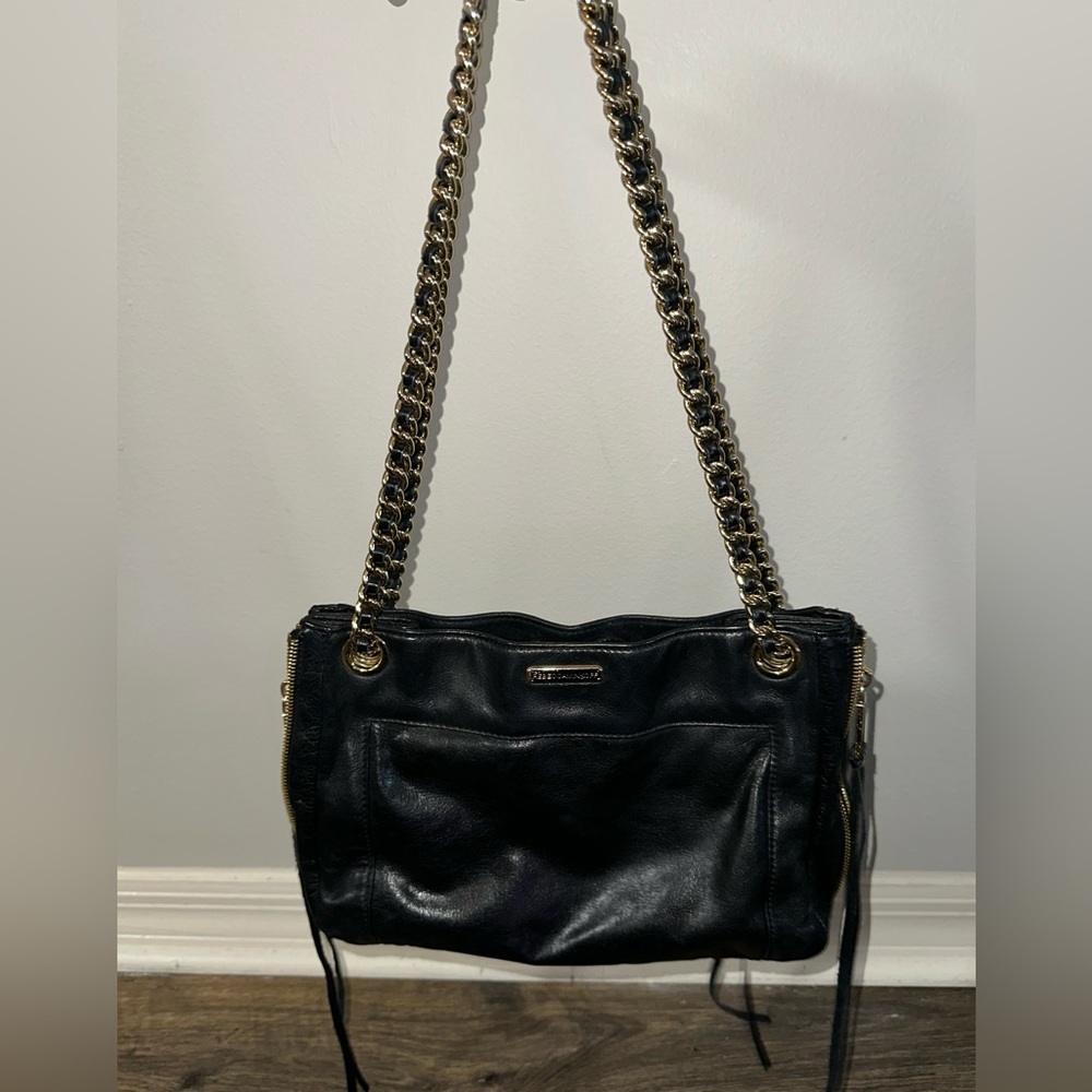 Black leather Rebecca Minkoff zipper bag with shoulder strap or crossbody option